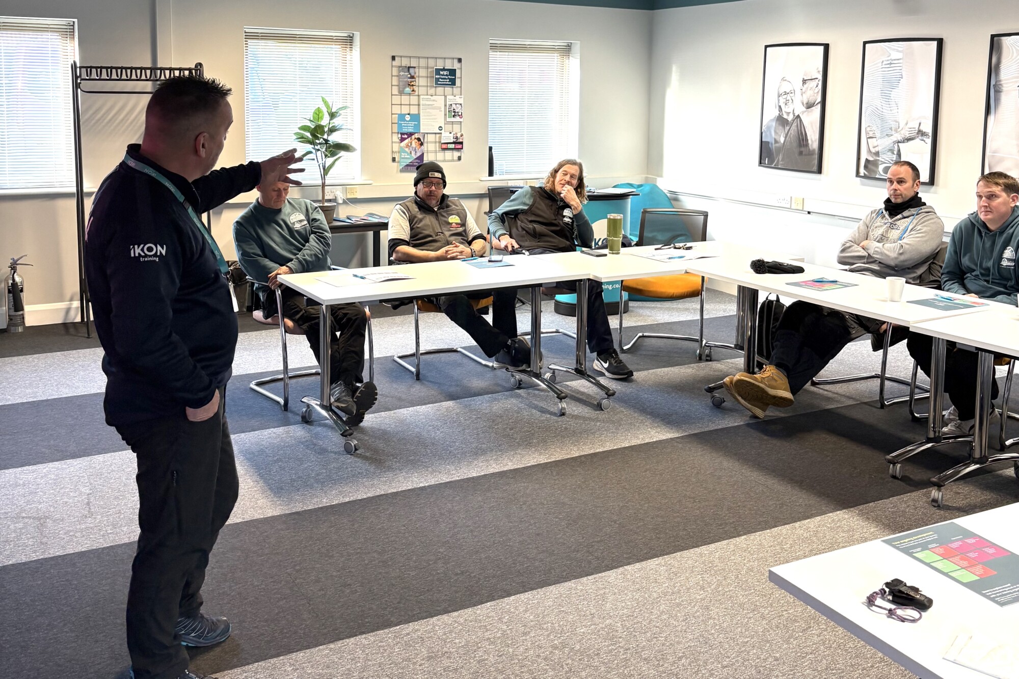 IKON Trainer Nick Pamment leading a De-Escalation & Personal Safety Class, teaching learners their organisation's policies to apply in their workplace.